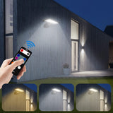 Wireless LED wall lamp with solar powered motion sensor